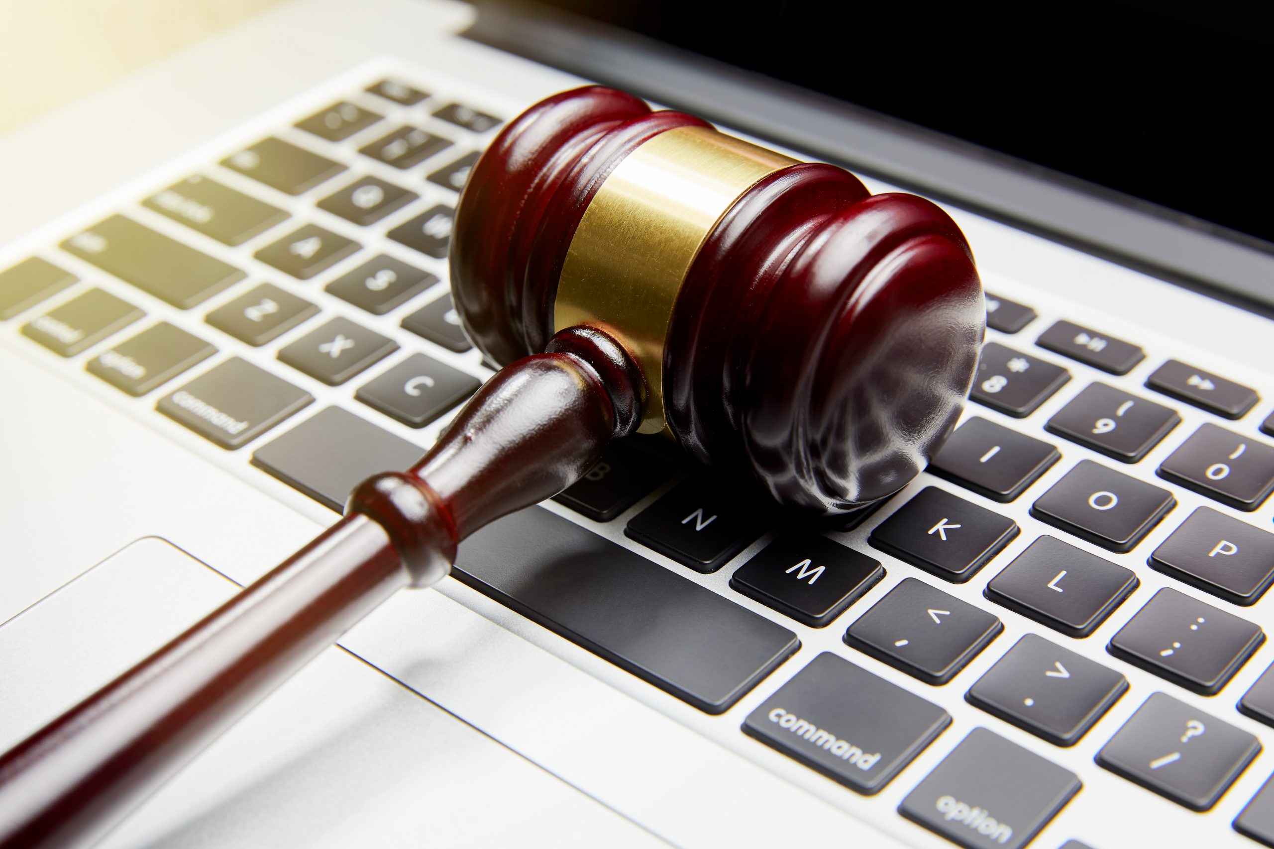 GAVEL ON COMPUTER KEYBOARD